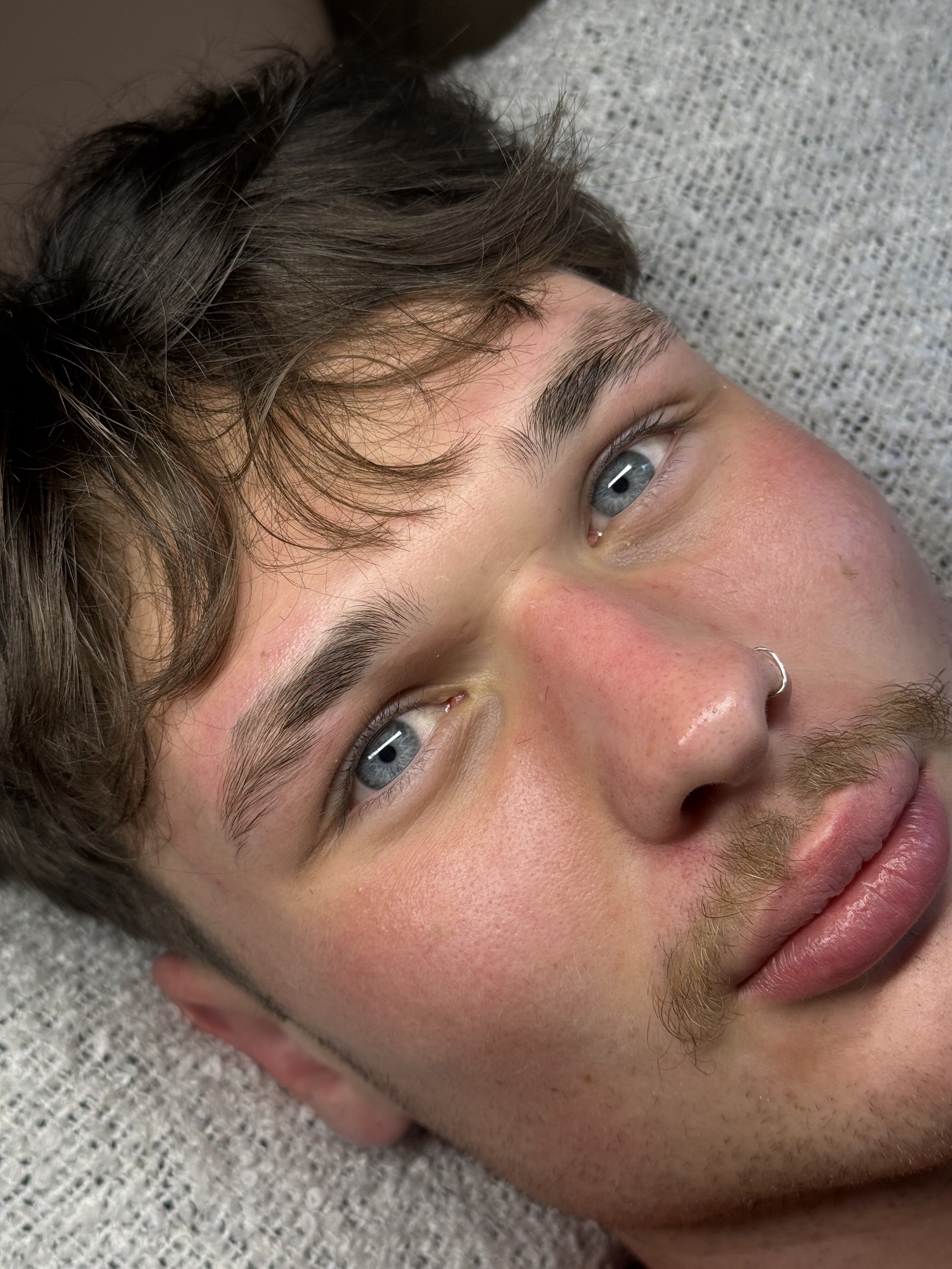 Brow tint result on a male client, natural defined brow shape